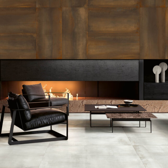 Bright living room interior with cozy sofa, poufs, panoramic window, concrete floor, coffee table, cupboard, marble wall, crockery. Concept of minimalist design. Mock up. 3D Rendering